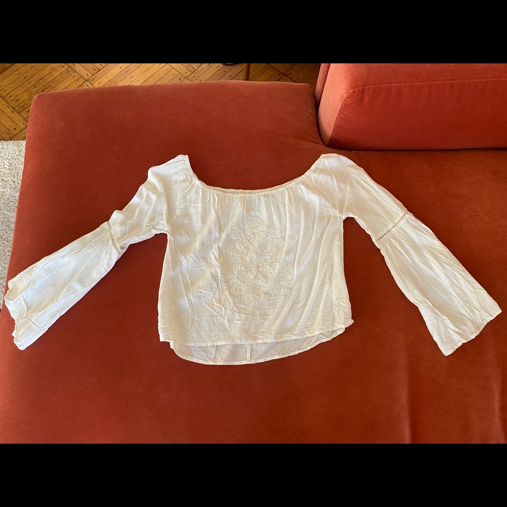 White flowy shirt with bell sleeves , size M, fits like an S